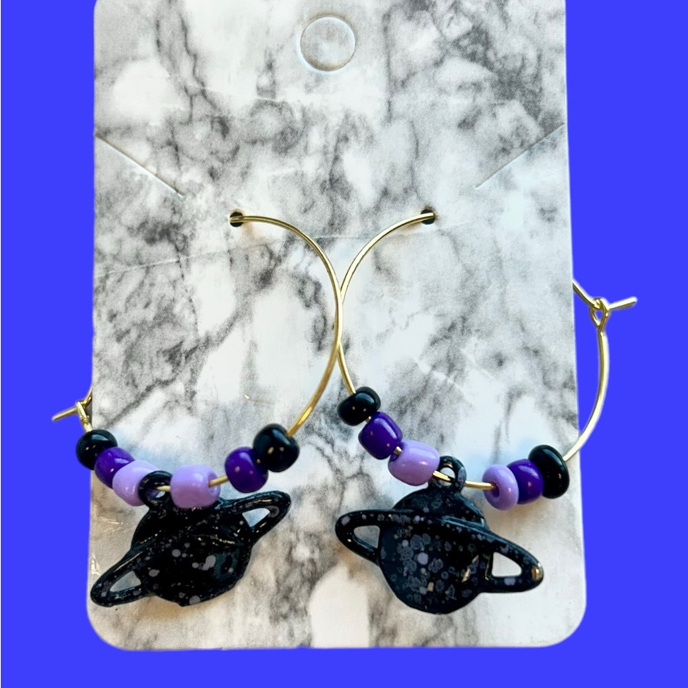 Unique handmade space hoop earrings.